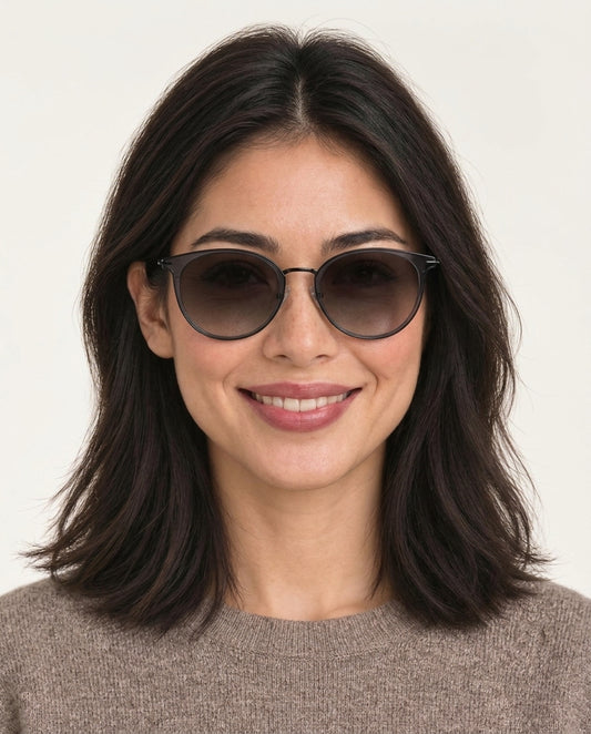 Model wearing Dormann Sun Rio de Janeiro panto round sunglasses in Charcoal/Gun Metal