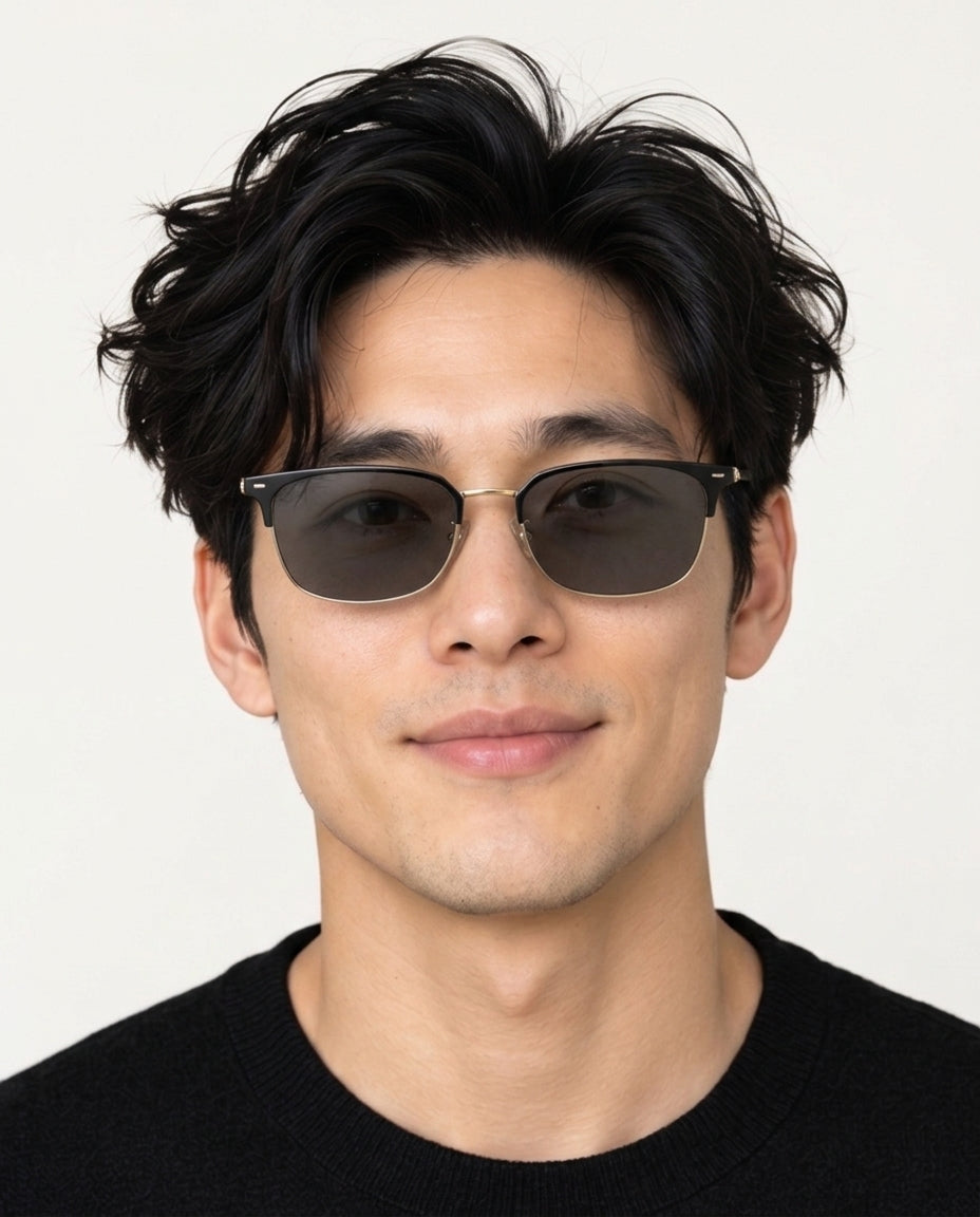 Model wearing Dormann Sun Sao Paulo rectangle eyebrow sunglasses in Black/Shiny Gold