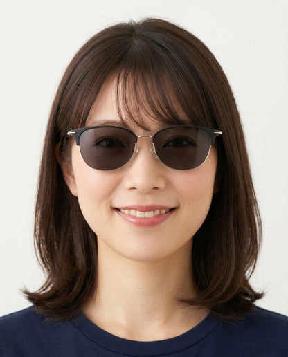 Model wearing Dormann Sun Kingston eyebrow round sunglasses in Black/Shiny Gold